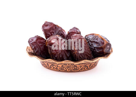 Close up macro photo of dates fruit, date fruits on isolated white Stock Photo