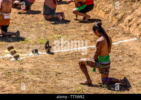 San Andres Semetabaj, Lake Atitlan, Guatemala - November 10, 2018:  Maya men perform ceremony before playing traditional Maya ballgame. Stock Photo