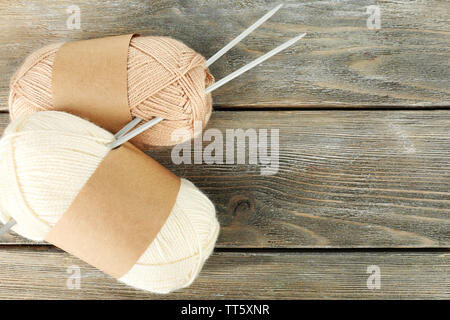 wooden knitting needles on background of grey merino wool blanket Stock  Photo - Alamy