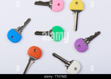 Keys from different doors with colorful handle for memory Stock Photo