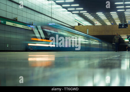 SANTIAGO, CHILE - OCTOBER 2015: A long exposure of a Metro de Santiago train entering Bellas Artes station Stock Photo