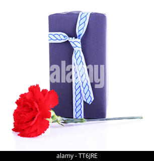 Gift box with red carnation isolated on white background Stock Photo