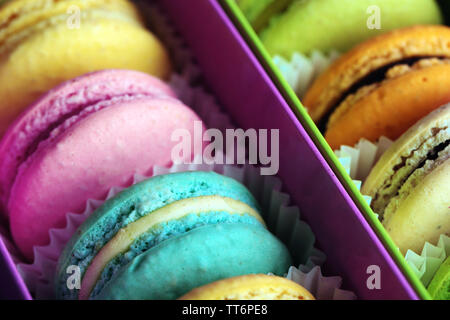 Assortment of gentle colorful macaroons in box, close-up Stock Photo