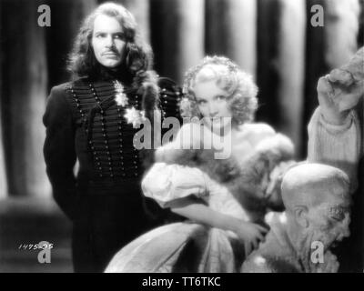 MARLENE DIETRICH as Catherine the Great of Russia and JOHN LODGE in THE SCARLET EMPRESS 1934 director Josef von STERNBERG Paramount Pictures Stock Photo