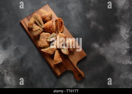 Bourekas delicious Middle Eastern hand pies. Baked, stuffed pastries filled with potato, mushrooms, tuna.A top Mediterranean comfort food, Stock Photo