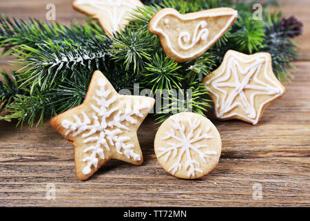 Gingerbread cookies with Christmas decoration on wooden table background Stock Photo