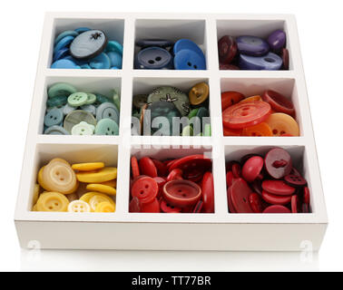 Various of sewing buttons in box isolated on white Stock Photo