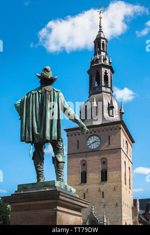 Cathdral Oslo, view of the tower of Oslo Domkirke (cathedral) with the rear of the statue of King Christian lV in the foreground, Norway. Stock Photo