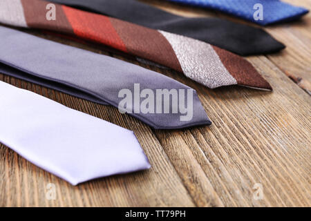 Different Ties on wooden planks background Stock Photo Alamy Different Ties on wooden planks background Stock Photo Alamy