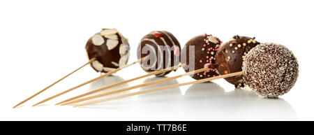 Tasty cake pops, isolated on white Stock Photo