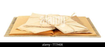Old letters and book isolated on white Stock Photo