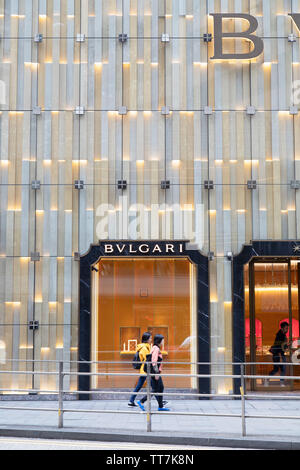 People walking past Bulgari store Central Hong Kong China Stock Photo Alamy