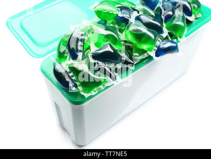 Gel capsules with laundry detergent in box isolated on white Stock Photo