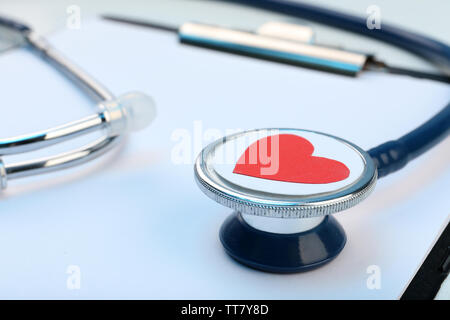 Stethoscope with heart close-up Stock Photo