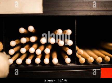 drum sticks tips front view on the shelf of a music store Stock Photo