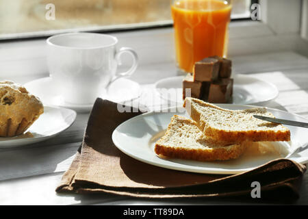 Delicious breakfast on windowsill background Stock Photo