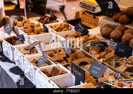 Fudge and sweets stall at farmers market, Stroud, Gloucestershire, UK Stock Photo