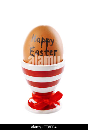 Boiled egg in holder isolated on white Stock Photo