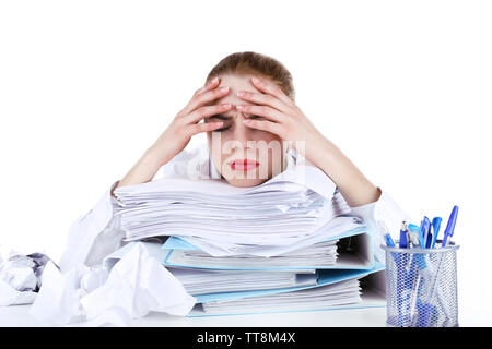 Tired woman at her workplace with documents isolated on white Stock Photo