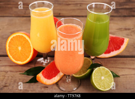 Fresh summer cocktails with fruits on wooden background Stock Photo