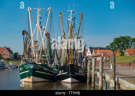 Fishing boats in harbour. Greetsiel. East Frisia, Lower Saxony, Germany Stock Photo