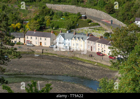 The picturesque Lower Town, the old port of Fishguard, with pretty harbour and cottages at the mouth of the Gwaum River, Pembrokeshire, Wales, UK Stock Photo