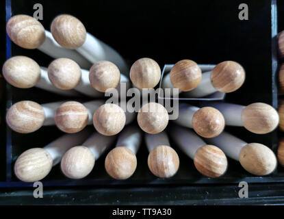 drum sticks tips front view on the shelf of a music store Stock Photo