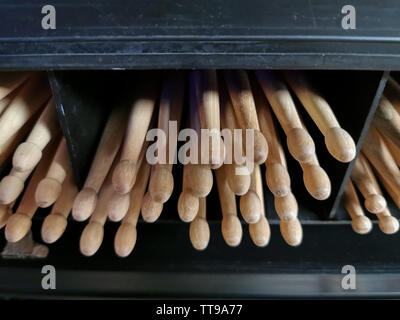 drum sticks tips front view on the shelf of a music store Stock Photo