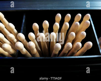 drum sticks tips front view on the shelf of a music store Stock Photo