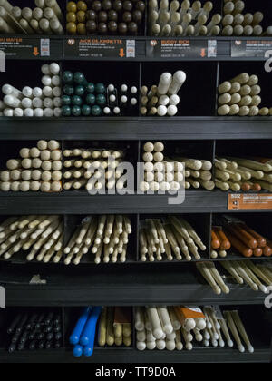 drum sticks tips front view on the shelf of a music store Stock Photo