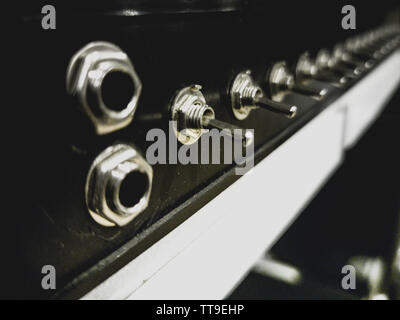 amplify switch buttons for concerts live performances Stock Photo - Alamy