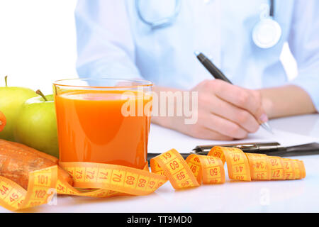 Nutritionist Doctor writing diet plan, closeup Stock Photo
