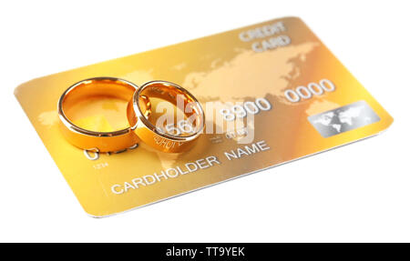 Premium Photo | Golden wedding rings and credit card isolated on white  marriage of convenience concept