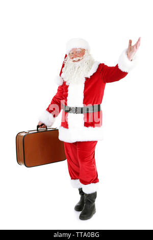 Santa Claus holding suitcase, isolated on white background Stock Photo