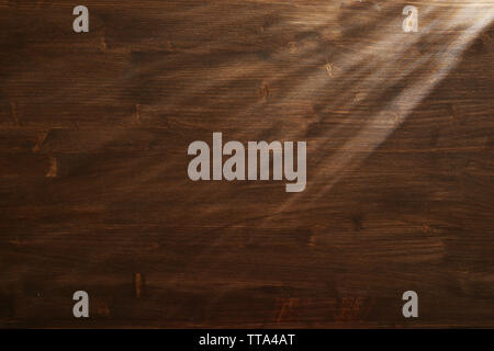 Light beam on wooden background Stock Photo