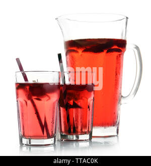 Full jug and glasses of strawberry juice isolated on white Stock Photo