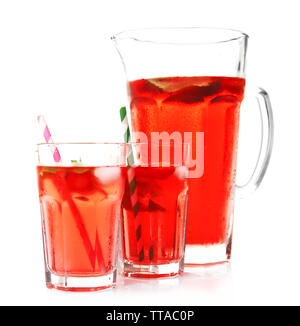 Full jug and glasses of strawberry juice isolated on white Stock Photo