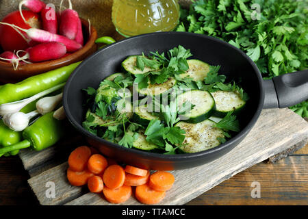 Sliced zucchini in pan on table, closeup Stock Photo