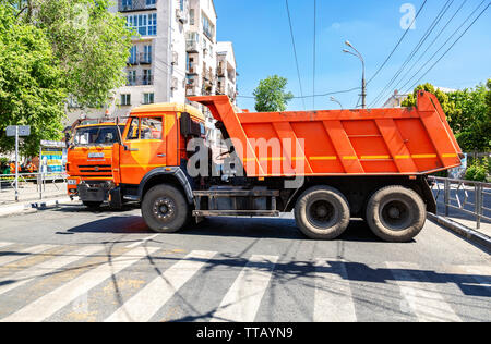 Samara, Russia - June 12, 2019: Heavy trucks Kamaz overlap the street in Samara during the festive mass procession Stock Photo