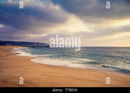 Sunset over the sea. Atlantic ocean in the evening. Nazare, Portugal, Europe Stock Photo