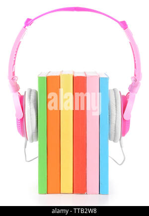 Books and headphones as audio books concept isolated on white Stock Photo