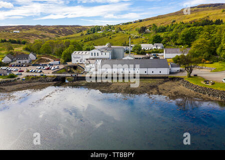 Aerial view of the Talisker Distillery, a single malt Scotch whisky distillery, on the west coast of Skye on the shores of Loch Harport in Carbost on Stock Photo