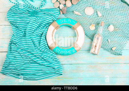Summer accessories on wooden background Stock Photo