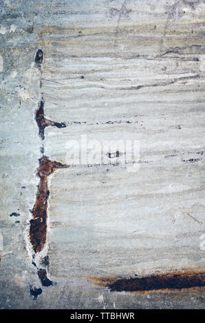 Picture of a scratched and stained wall, color toned abstract background or texture. Stock Photo