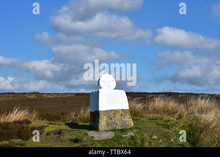 Large fat betty whitewashed stone memorial on the moors. Stock Photo