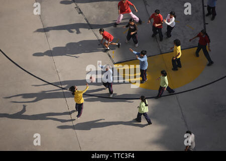 Friends playing basketball Stock Photo