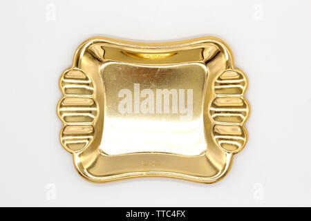 Vintage black and golden promotional souvenir ashtray Cinzano, isolated on a white background, close up Stock Photo