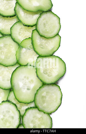 Sliced cucumbers isolated on white Stock Photo