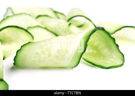 Sliced cucumbers isolated on white Stock Photo