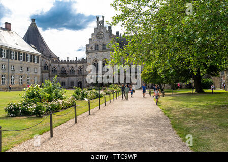 Bad Bentheim, Germany - June 9, 2019. View to the manor of the historical castle Bentheim, visible walking tourists. Stock Photo